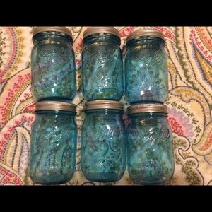 Six Ball mason jars with perforated lids